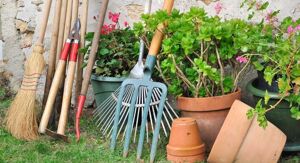 Garden tools for easy maintenance of a low-maintenance small garden design.
